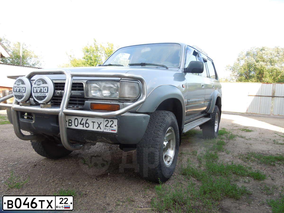 Фото автомобиля TOYOTA LANDCRUISER, 1994 — госномер М570ЕР77. Цвет: СИНИЙ МЕТАЛЛИК