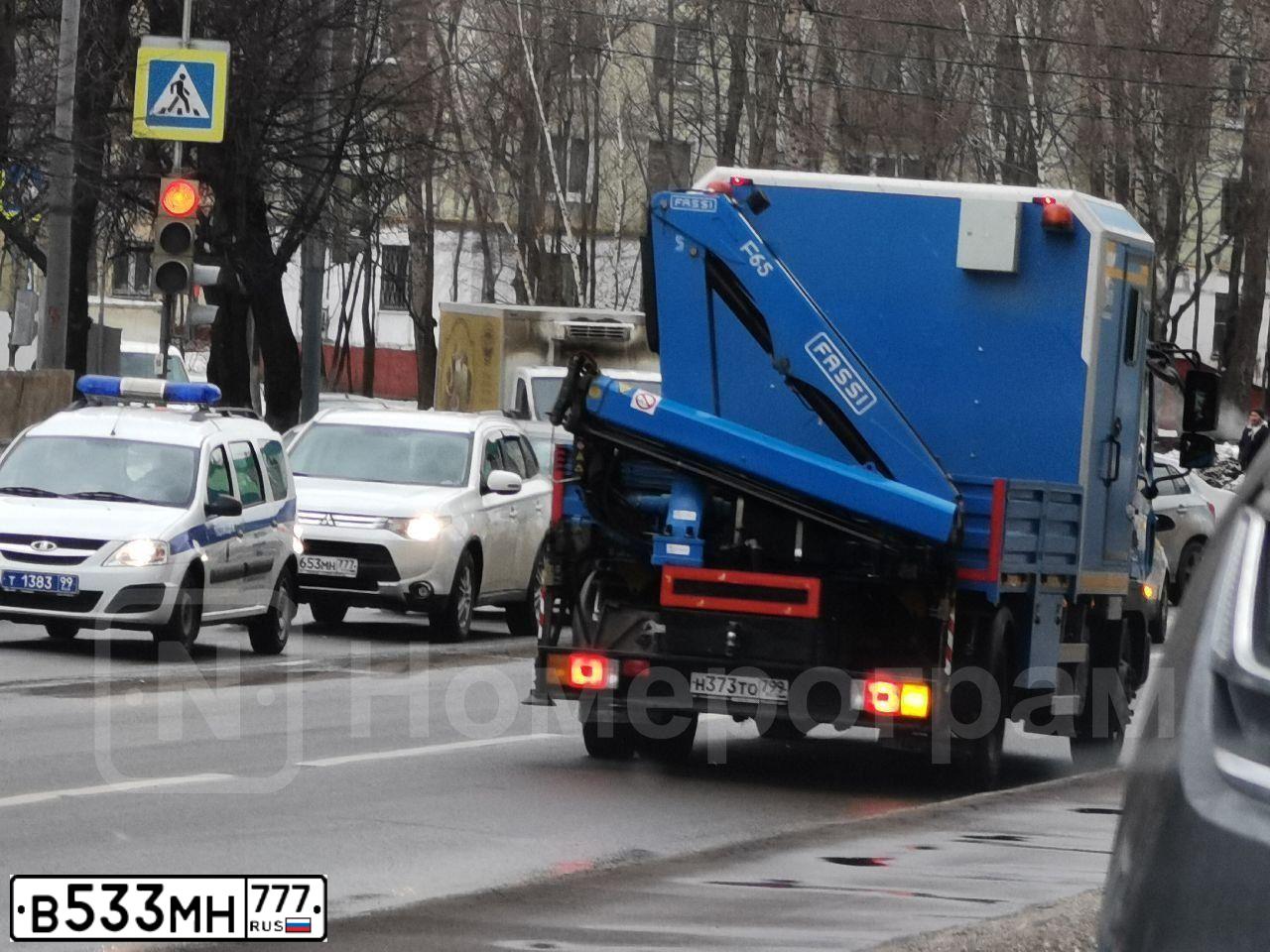 Фото автомобиля NISSAN CABSTAR, 2014 — госномер С033ОО799. Цвет: Белый