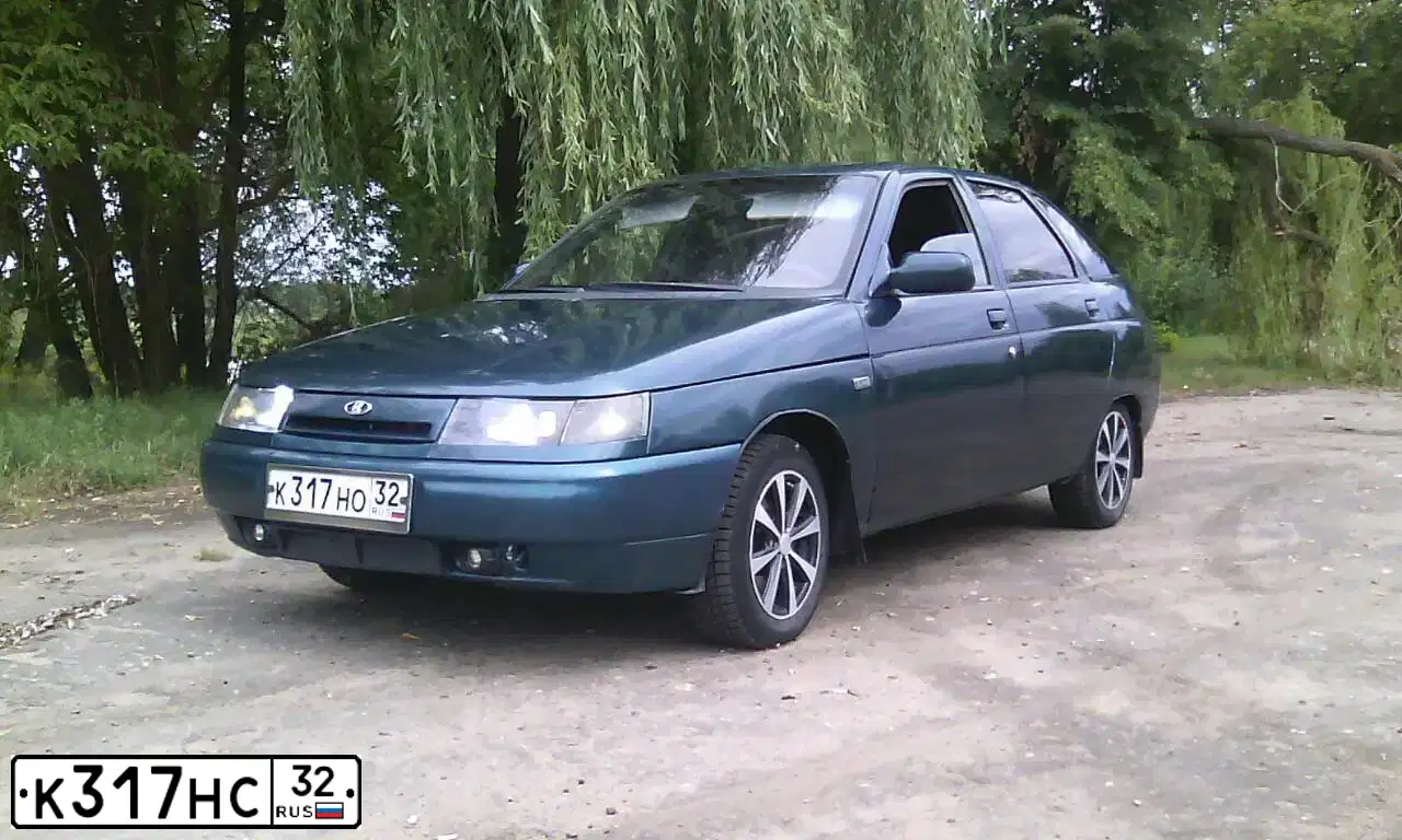 Фото автомобиля LADA 2109 SAMARA, 2001 — госномер К317НС32. Цвет: ТЕМНО-КРАСНЫЙ