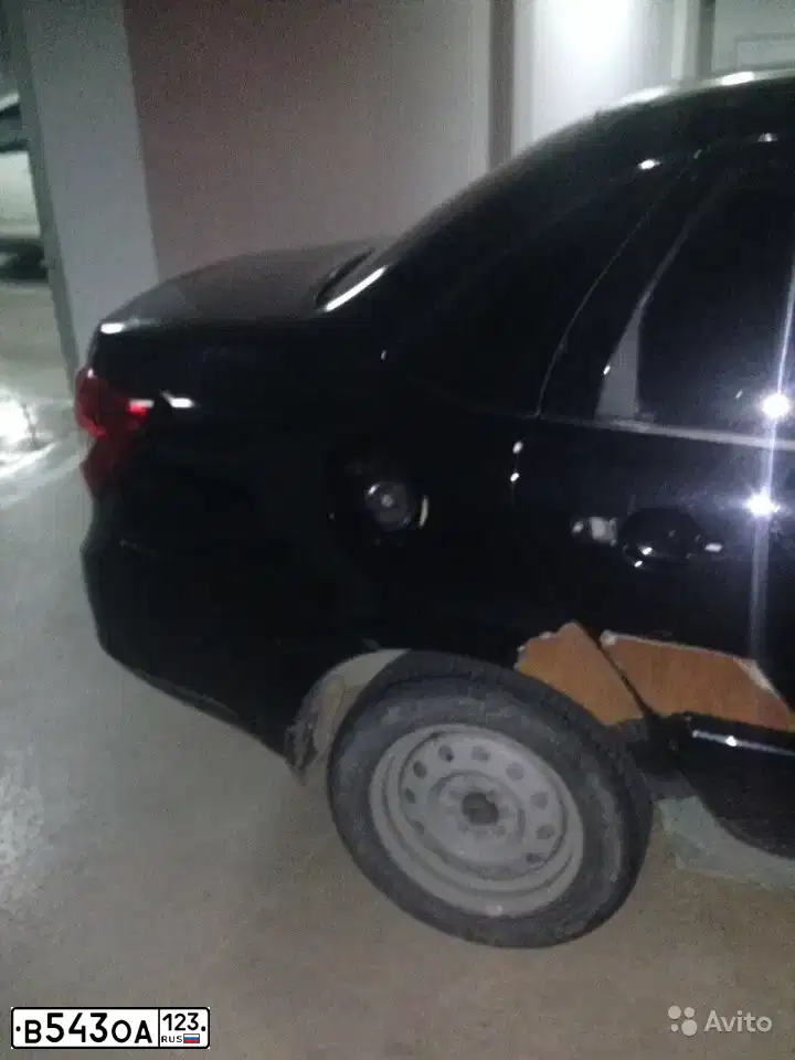 Фото автомобиля LADA 2190 GRANTA, 2014 — госномер О126ХР161. Цвет: Сине-Черный