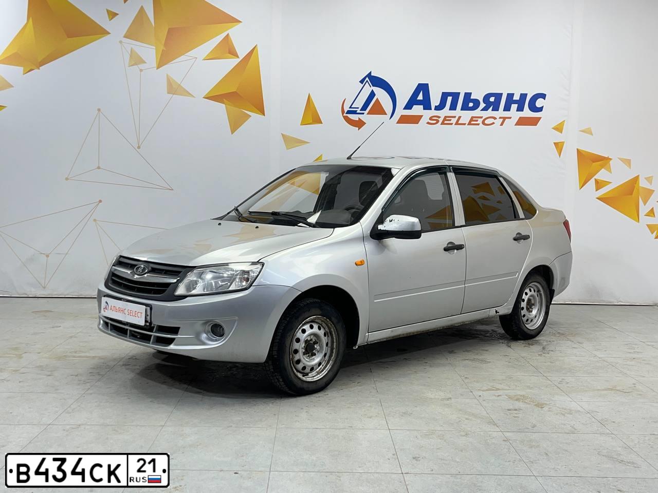 Фото автомобиля LADA GRANTA, 2013 — госномер Н902МО21. Цвет: СЕРЕБРИСТЫЙ