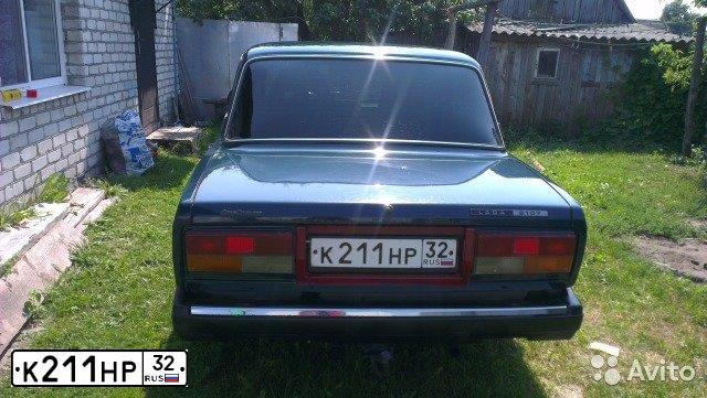 Фото автомобиля LADA 2107, 2005 — госномер К211НР32. Цвет: ТЕМНО-ЗЕЛЕНЫЙ