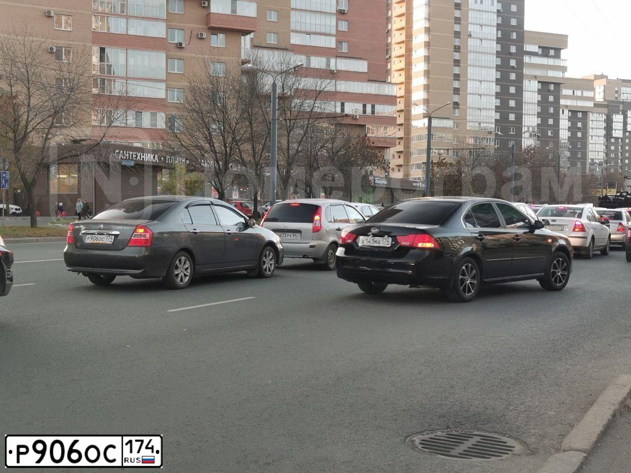 Фото автомобиля LIFAN SOLANO, 2013 — госномер Р906ОС174. Цвет: СТАЛЬНОЙ (СЕРЫЙ)