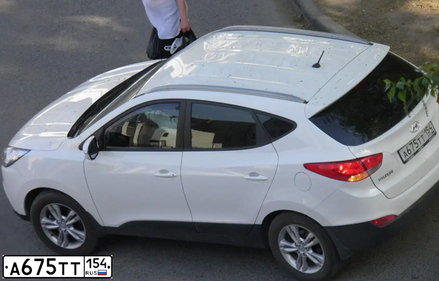 Фото автомобиля HYUNDAI IX35, 2011 — госномер М772ВО154. Цвет: Белый