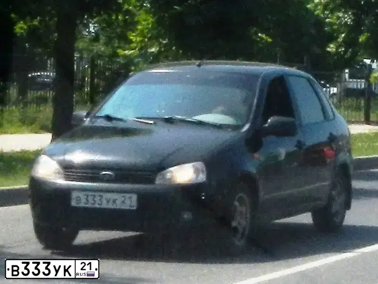 Фото автомобиля LADA 1118 KALINA, 2010 — госномер В333УК21. Цвет: ЧЕРНЫЙ