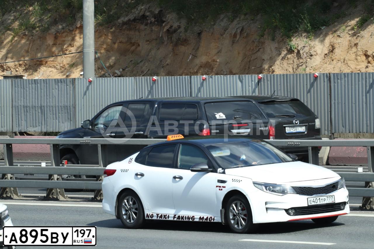 Фото автомобиля MAZDA CX-7, 2010 — госномер О707УУ44. Цвет: ЧЕРНЫЙ