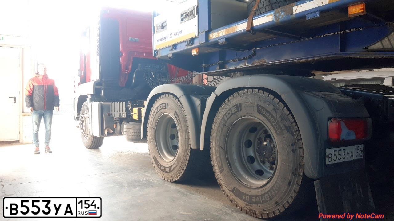 Фото автомобиля MAN TGS 26/33.XXX /6X4/, 2012 — госномер В553УА154. Цвет: КРАСНЫЙ