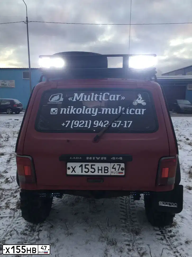 Фото автомобиля LADA 2121 NIVA, 2002 — госномер Х155НВ47. Цвет: ТЕМНО-БОРДОВЫЙ