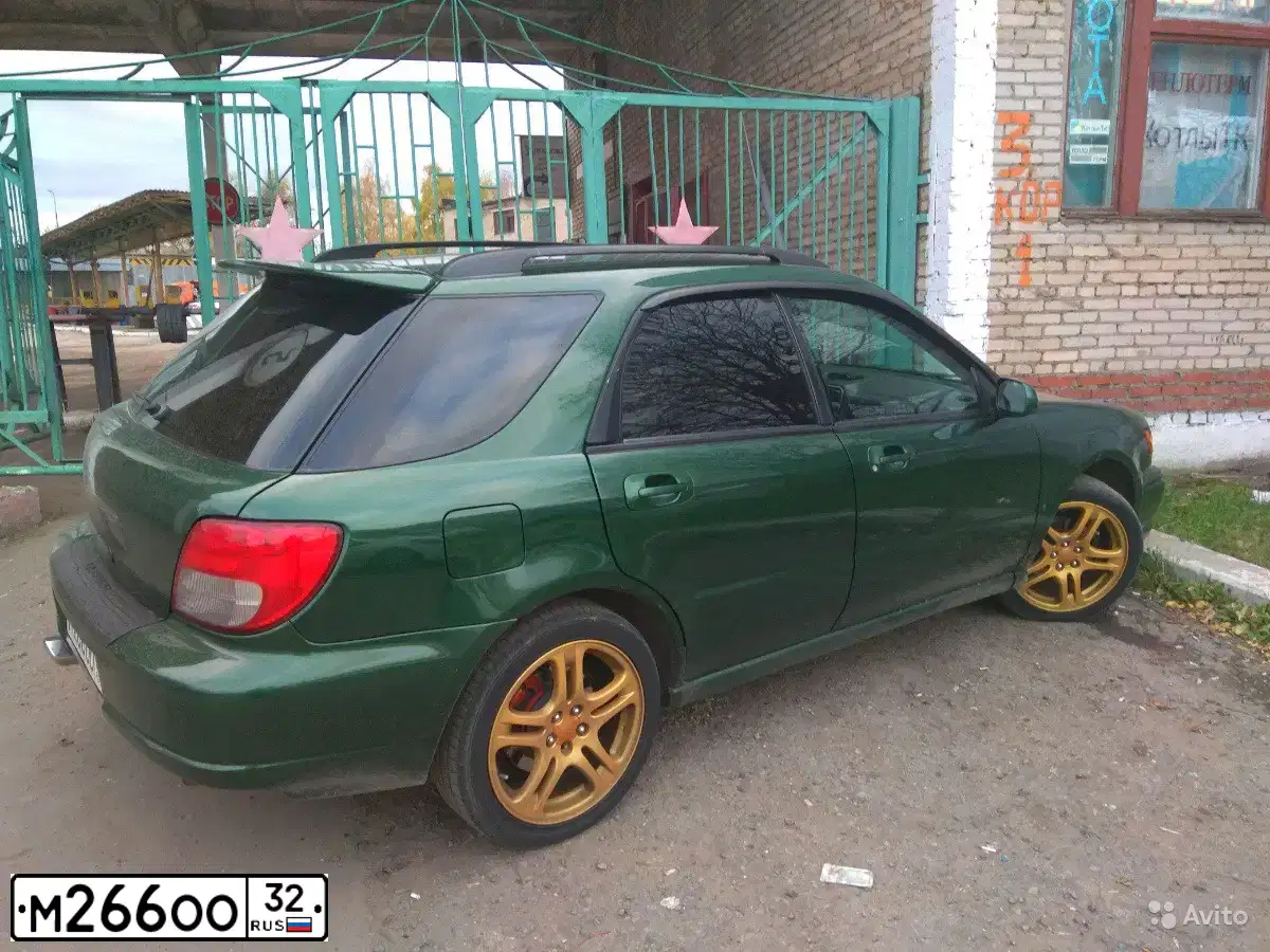 Фото автомобиля SUBARU IMPREZA, 2001 — госномер С257МХ790. Цвет: ЗЕЛЕНЫЙ