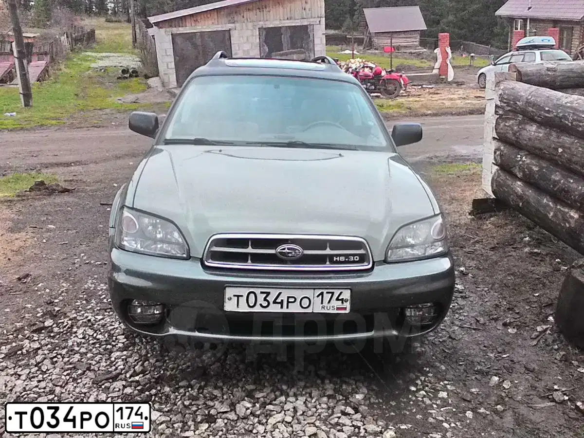 Фото автомобиля SUBARU OUTBACK, 2003 — госномер Т034РО174. Цвет: СЕРО-ЗЕЛЕНЫЙ