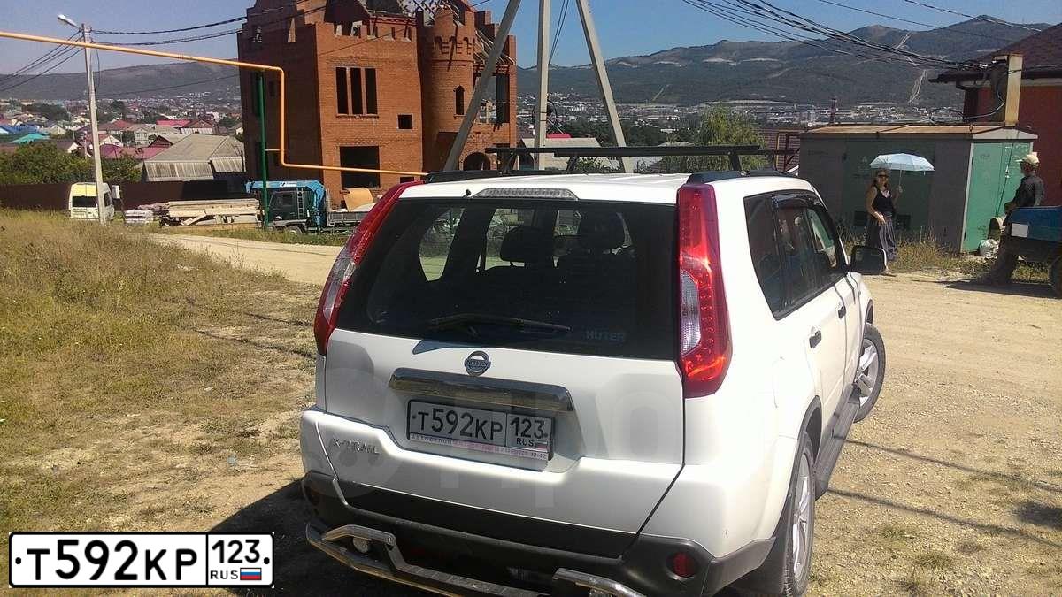 Фото автомобиля NISSAN X-TRAIL, 2012 — госномер Т318ВВ977. Цвет: Белый