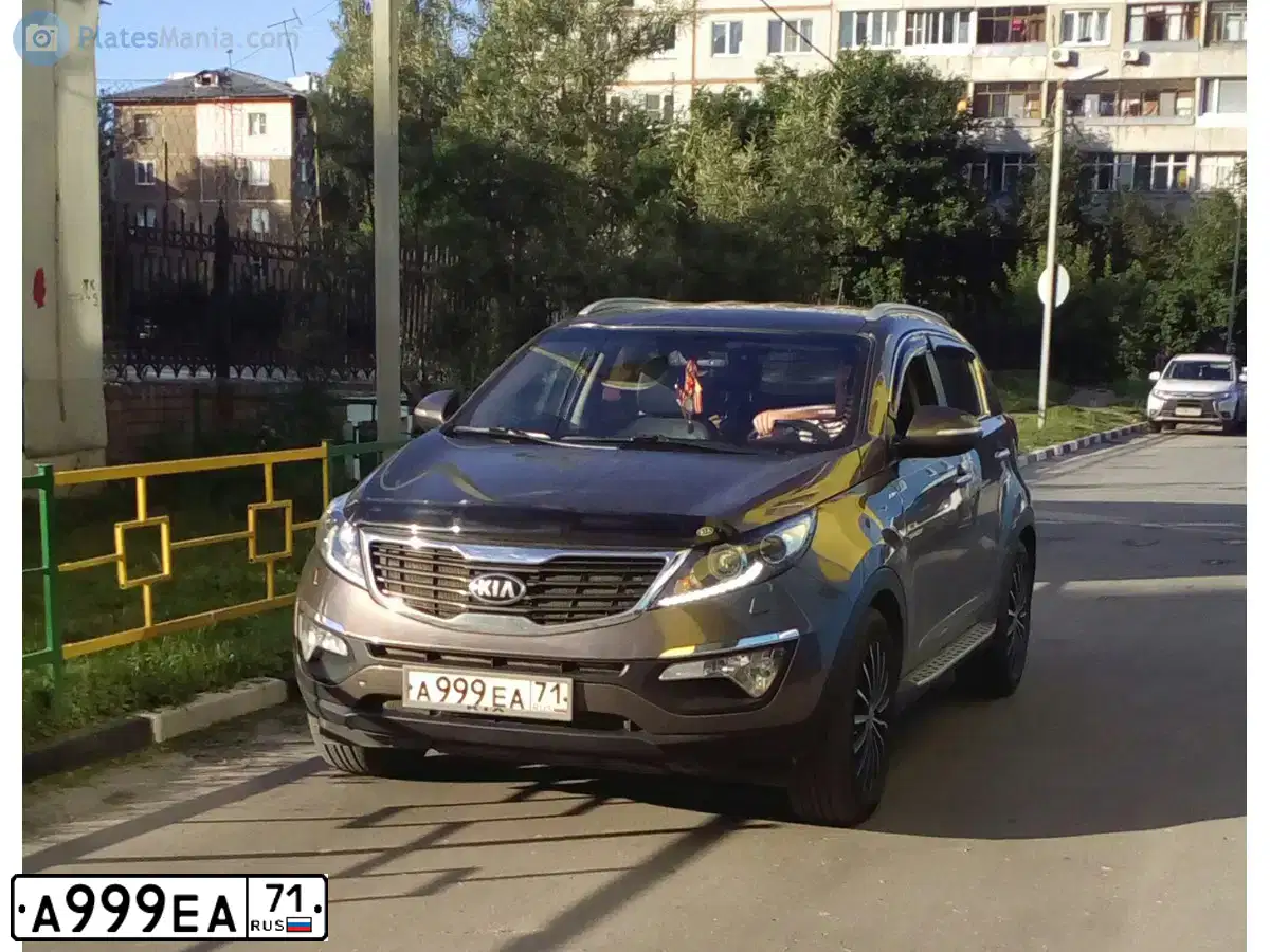 Фото автомобиля KIA SPORTAGE, 2013 — госномер А999ЕА71. Цвет: Коричневый