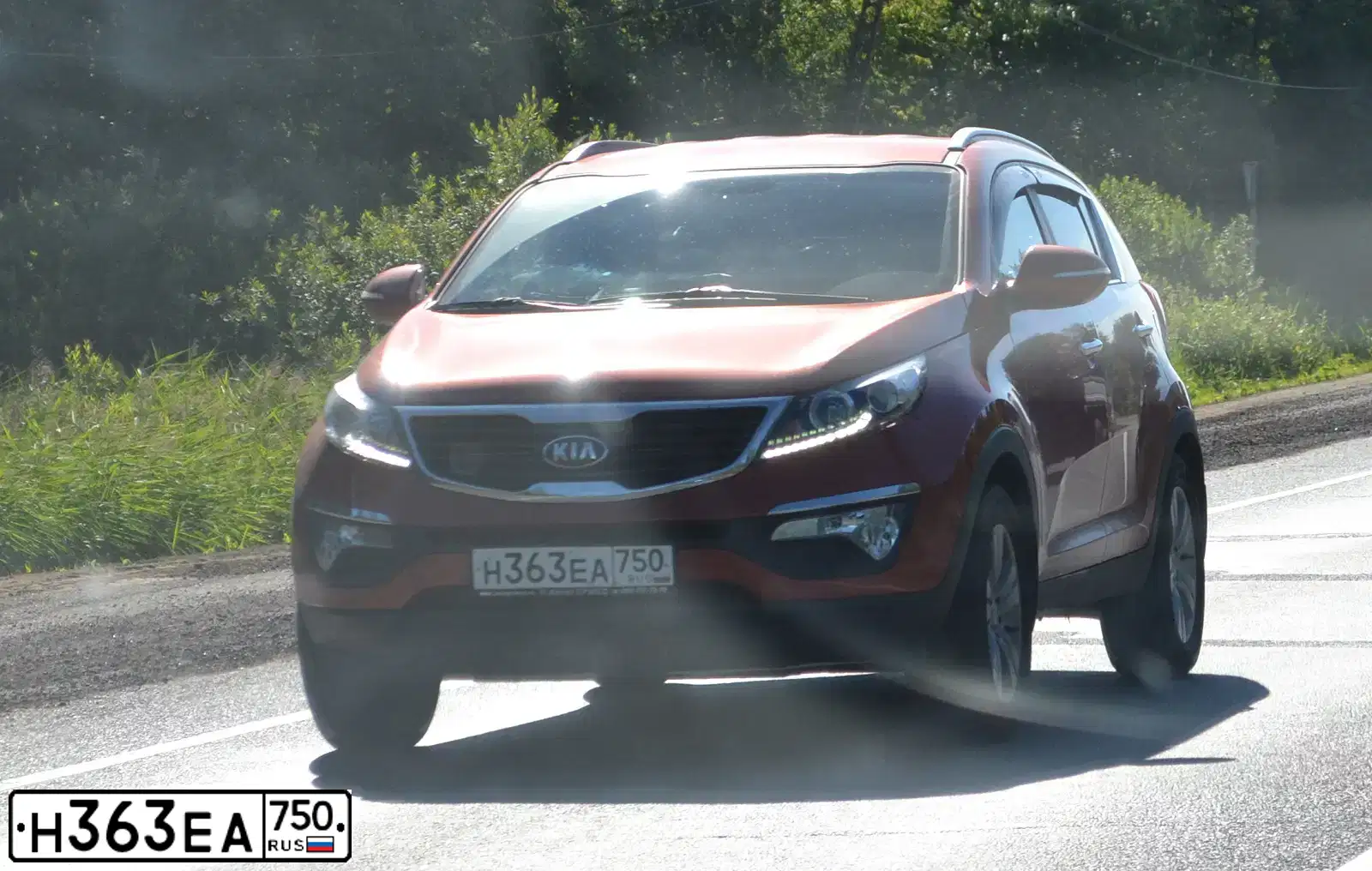 Фото автомобиля KIA SPORTAGE, 2013 — госномер Н100ТМ62. Цвет: Оранжевый
