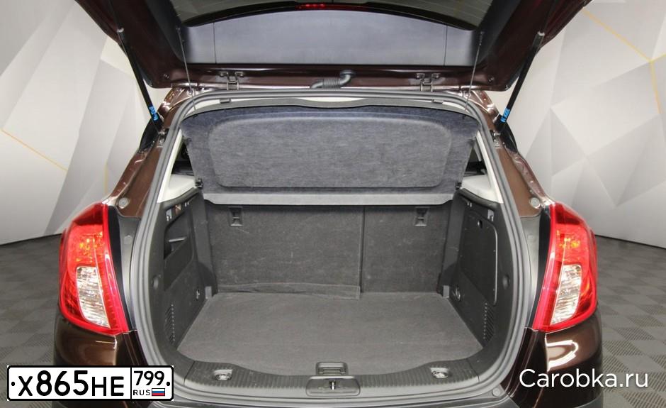 Фото автомобиля OPEL MOKKA, 2014 — госномер Е172МК777. Цвет: Коричневый