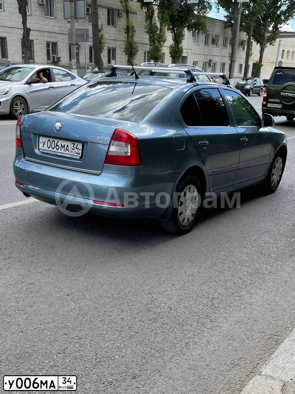 Фото автомобиля SKODA OCTAVIA, 2009 — госномер У006МА34. Цвет: СЕРО ГОЛУБОЙ
