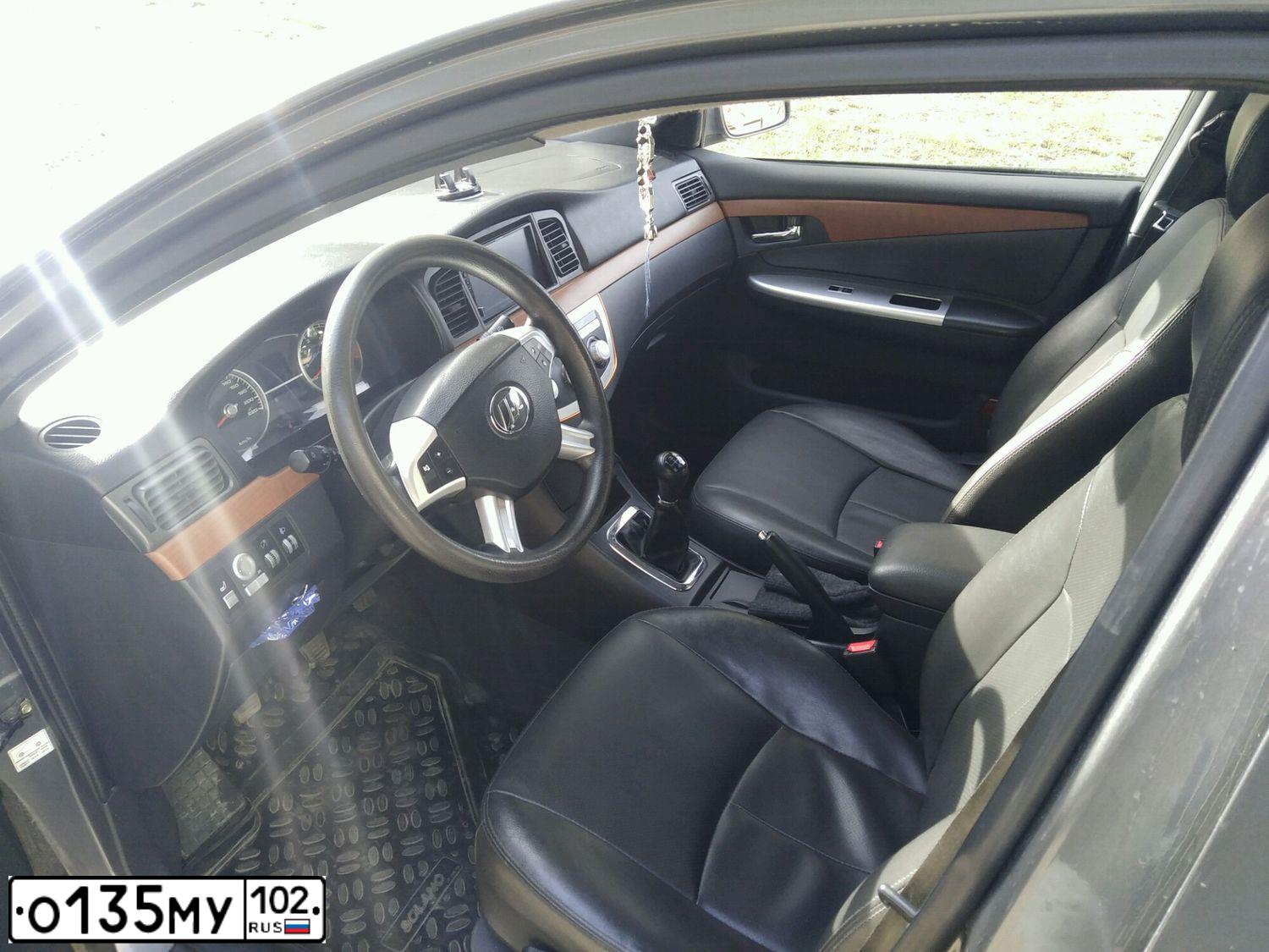 Фото автомобиля LIFAN SOLANO, 2013 — госномер Е264МХ702. Цвет: СТАЛЬНОЙ (СЕРЫЙ)