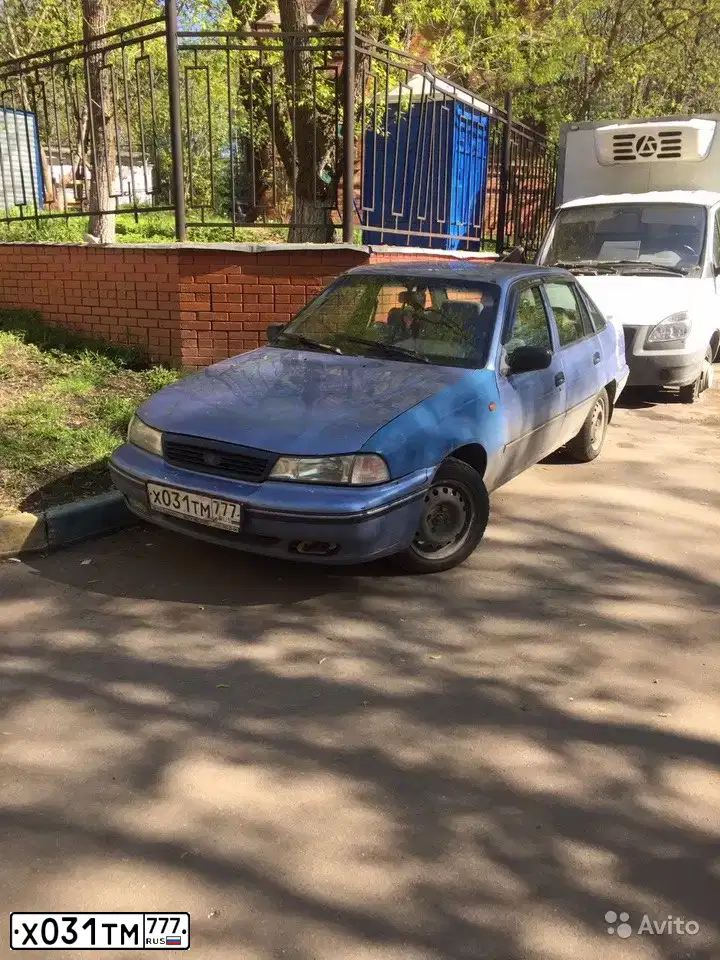 Фото автомобиля DAEWOO NEXIA, 2006 — госномер У082НН177. Цвет: синий