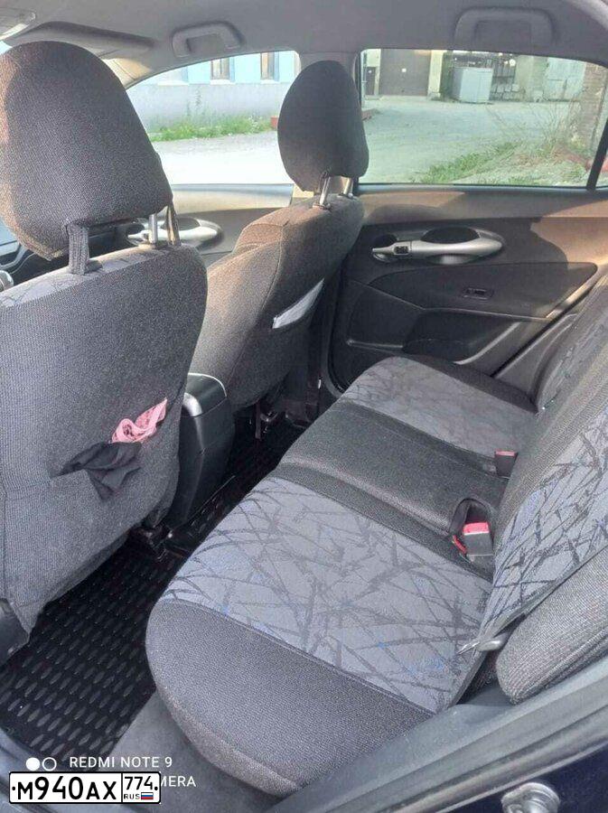 Фото автомобиля TOYOTA AURIS, 2008 — госномер М940АХ774. Цвет: Темно-синий
