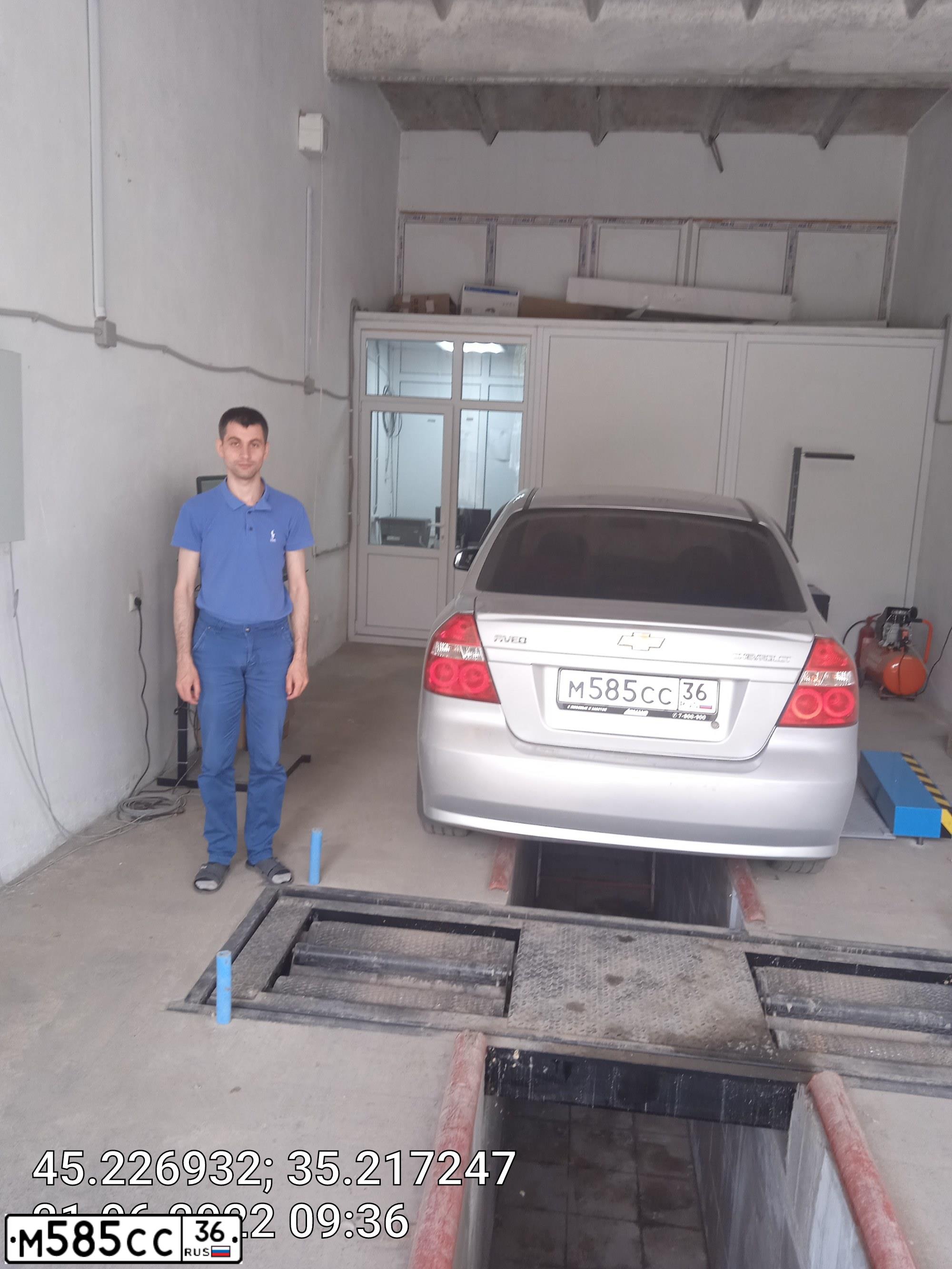 Фото автомобиля CHEVROLET AVEO, 2010 — госномер Е886ХМ82. Цвет: СЕРЕБРИСТЫЙ