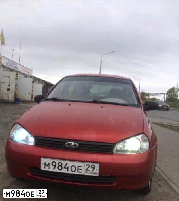 Фото автомобиля LADA 1119 KALINA, 2007 — госномер М984ОЕ29. Цвет: СЕРЕБРИСТО-КРАСНЫЙ