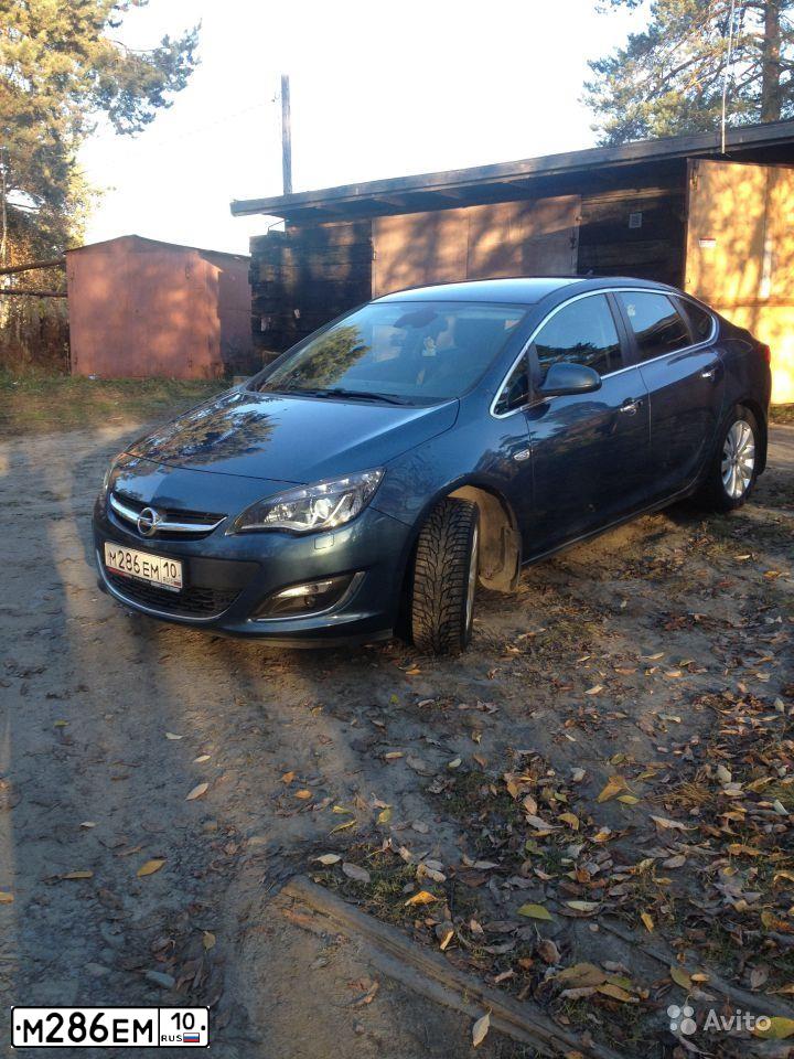 Фото автомобиля OPEL ASTRA, 2012 — госномер Е769МН147