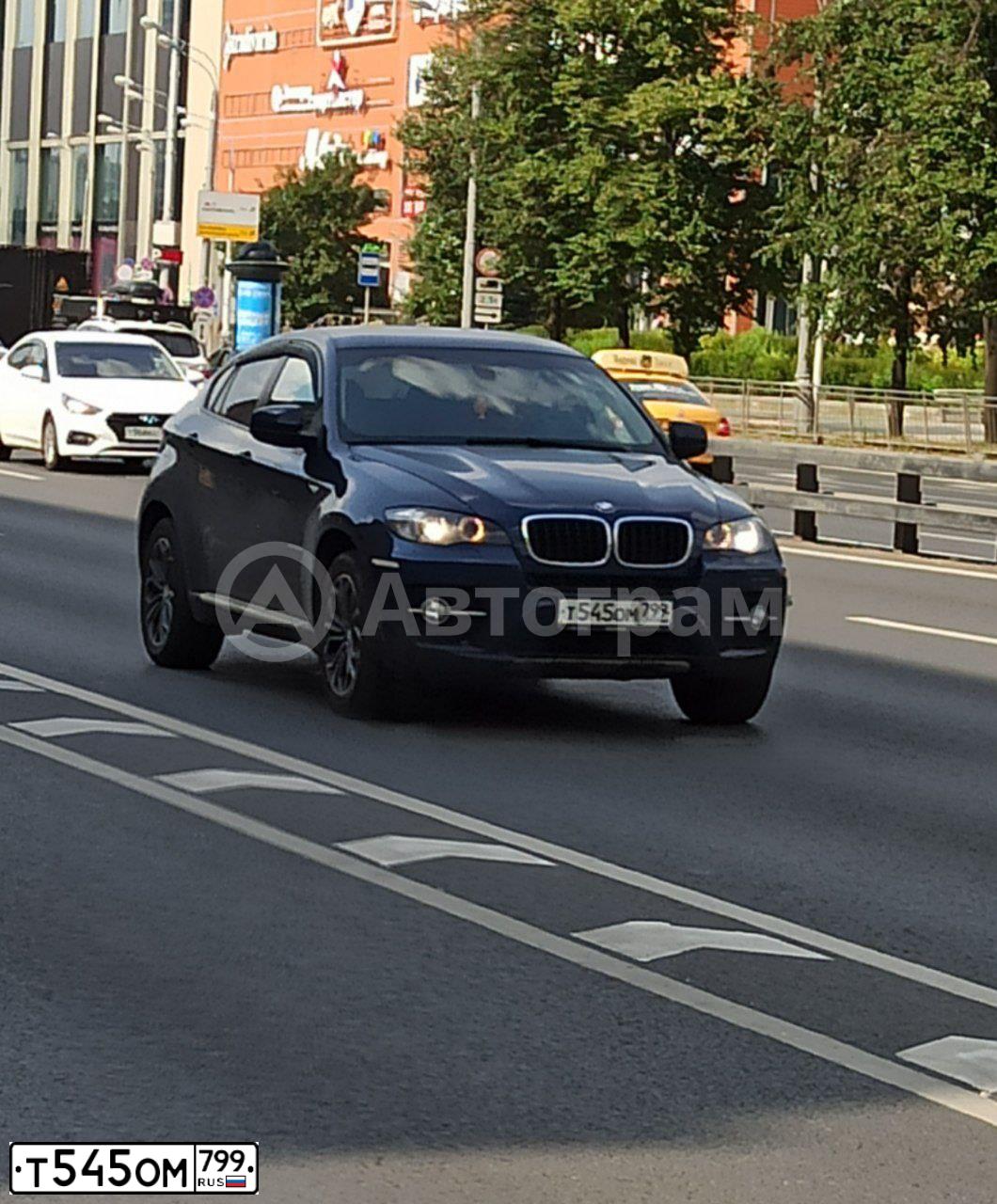 Фото автомобиля BMW X6, 2012 — госномер В100ТТ97. Цвет: СИНИЙ