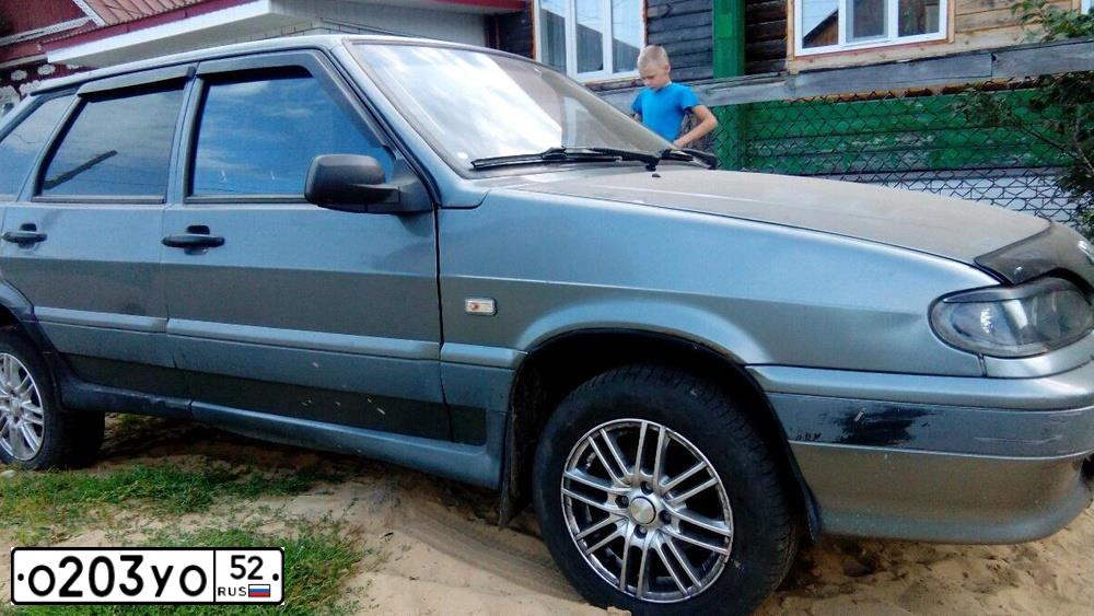 Фото автомобиля LADA 2114 SAMARA, 2004 — госномер О203УО52. Цвет: средний серо-зеленый металлик