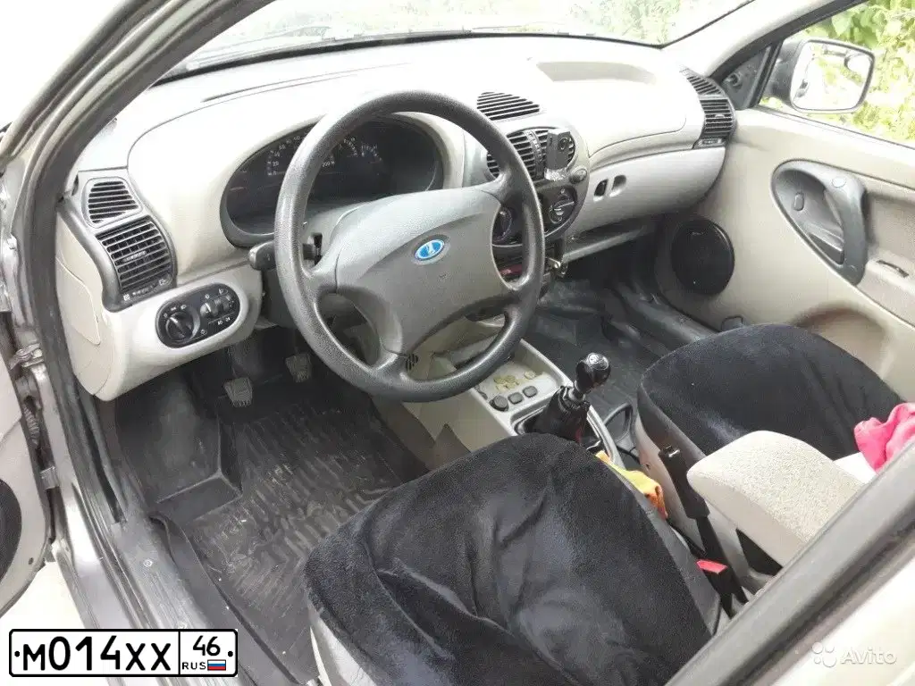 Фото автомобиля LADA 1119 KALINA, 2010 — госномер М014ХХ46. Цвет: Темно-серый металлик