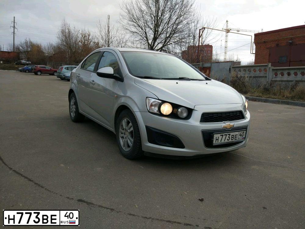 Фото автомобиля CHEVROLET AVEO, 2012 — госномер У256КЕ71. Цвет: Серебристый