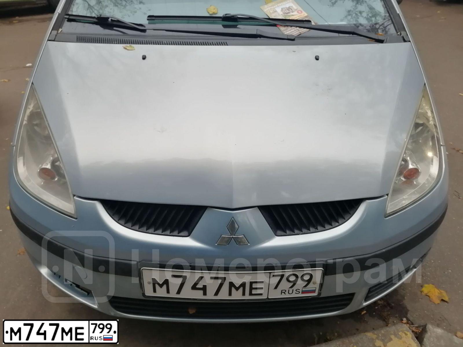 Фото автомобиля MITSUBISHI COLT, 2005 — госномер С935КВ777. Цвет: СВЕТЛО-ГОЛУБОЙ