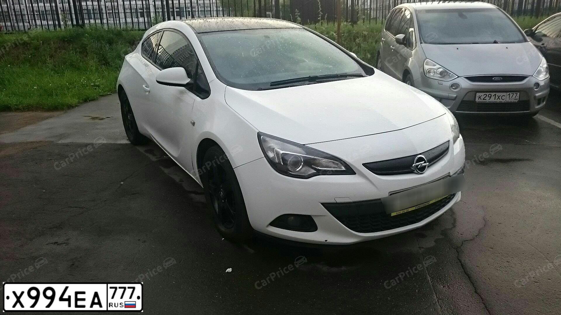 Фото автомобиля OPEL ASTRA, 2012 — госномер Т875УУ71. Цвет: Белый