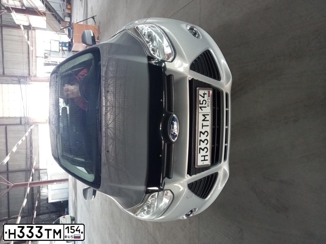 Фото автомобиля FORD FOCUS, 2012 — госномер О263КВ154. Цвет: СЕРО-ГОЛУБОЙ