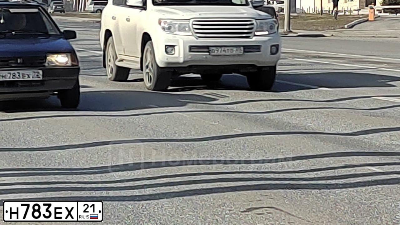 Фото автомобиля RENAULT LOGAN, 2012 — госномер Н783ЕХ21. Цвет: синий