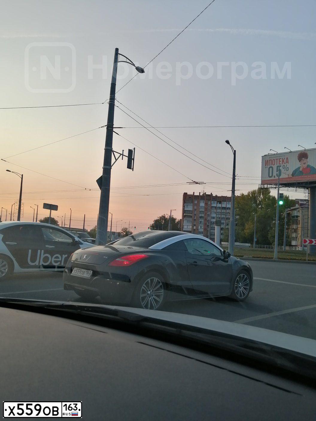 Фото автомобиля PEUGEOT RCZ, 2010 — госномер Х559ОВ163. Цвет: ЧЕРНЫЙ