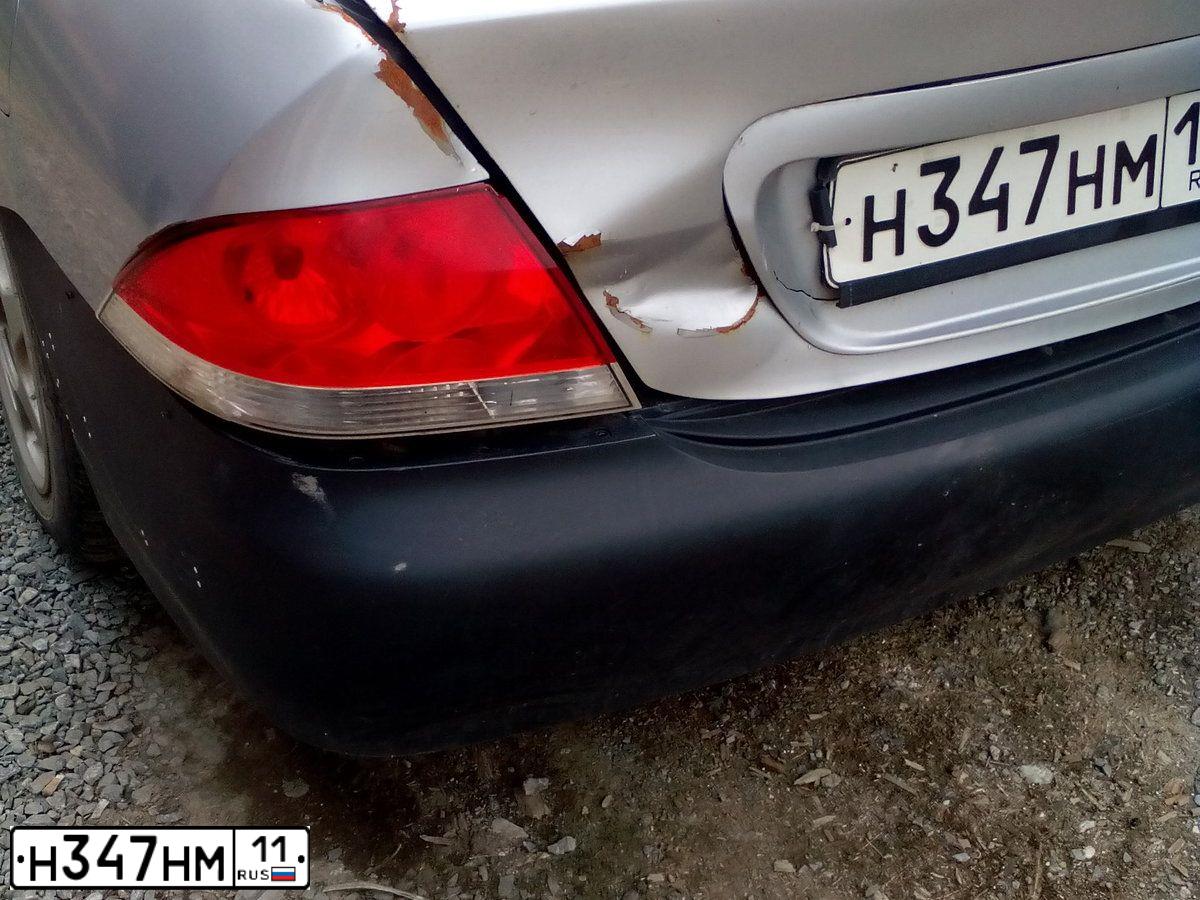 Фото автомобиля NISSAN TIIDA, 2008 — госномер Н347НМ11. Цвет: ЧЕРНЫЙ