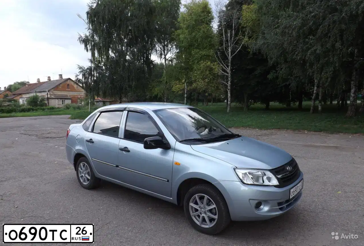 Фото автомобиля LADA 2190 GRANTA, 2012 — госномер О690ТС26. Цвет: ГОЛУБОЙ