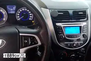 Фото автомобиля HYUNDAI SOLARIS, 2014 — госномер Т889ОУ64. Цвет: СЕРЕБРИСТЫЙ