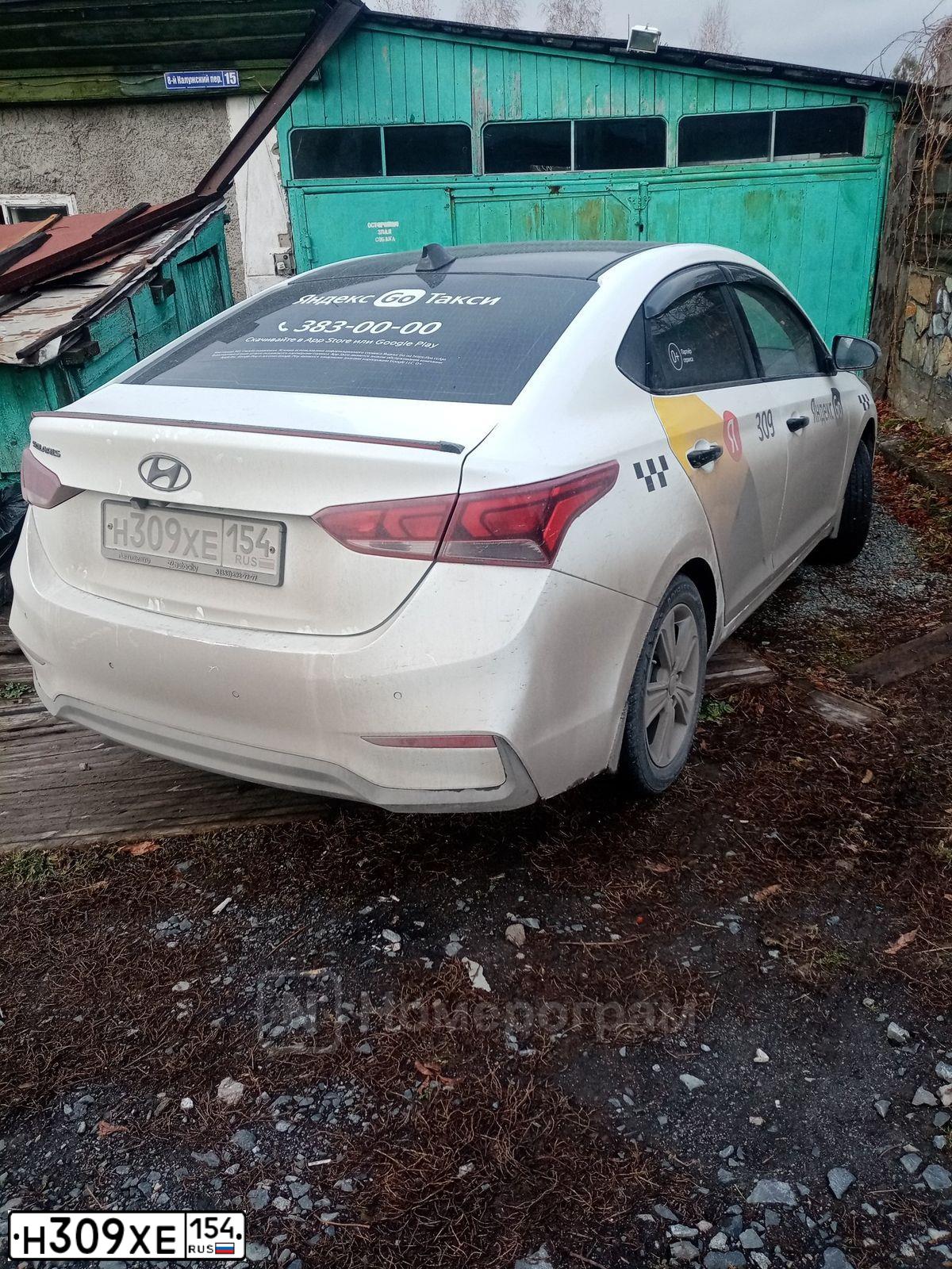 Фото автомобиля HYUNDAI SOLARIS, 2017 — госномер Н309ХЕ154. Цвет: Белый
