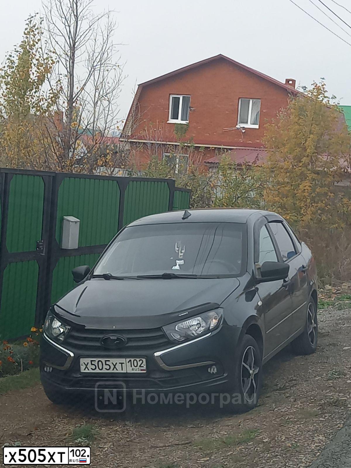 Фото автомобиля LADA 2190 GRANTA, 2019 — госномер М600ЕН702. Цвет: СЕРЕБРИСТО-ТЕМНО-СЕРЫЙ
