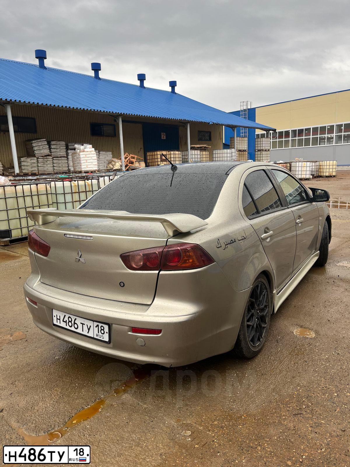 Фото автомобиля FORD D FOCUS, 1999 — госномер Н486ТУ18. Цвет: ЗОЛОТИСТЫЙ