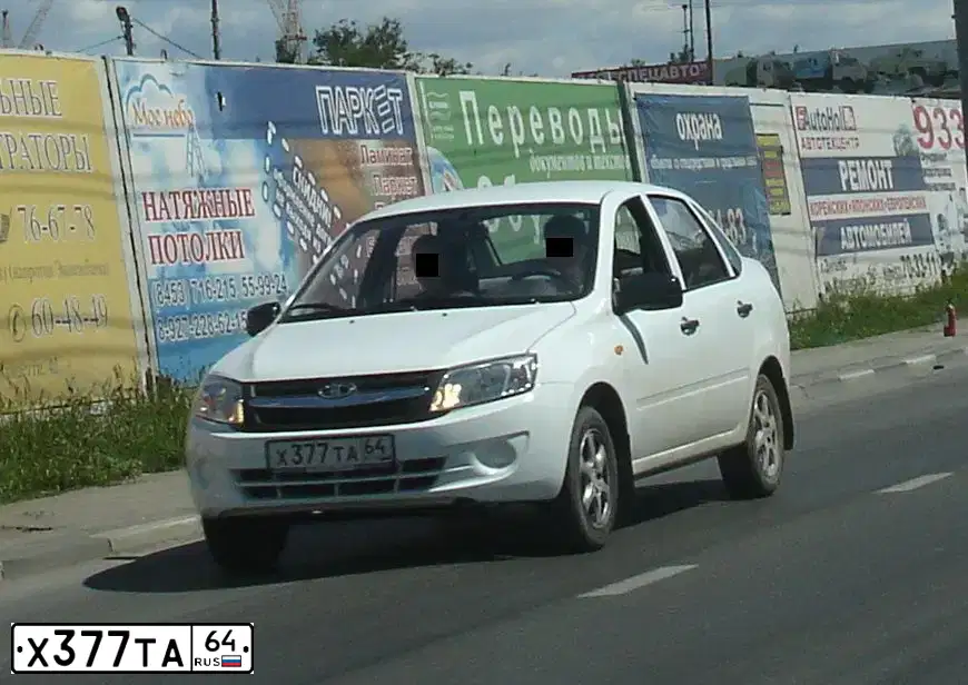 Фото автомобиля LADA 2190 GRANTA, 2012 — госномер М353АВ164. Цвет: БЕЛЫЙ