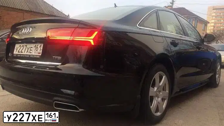 Фото автомобиля AUDI A6, 2016 — госномер У227ХЕ161. Цвет: ЧЕРНЫЙ