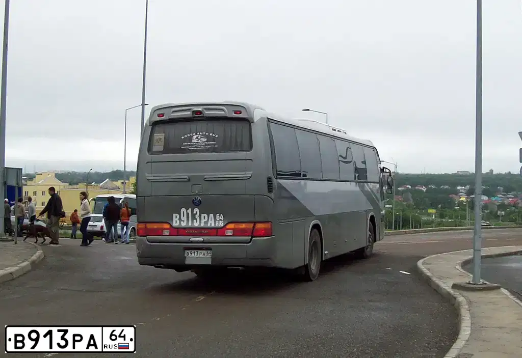 Фото автомобиля KIA GRANDBIRD, 1999 — госномер Р137ВЕ761. Цвет: ТЕМНО-СЕРЫЙ