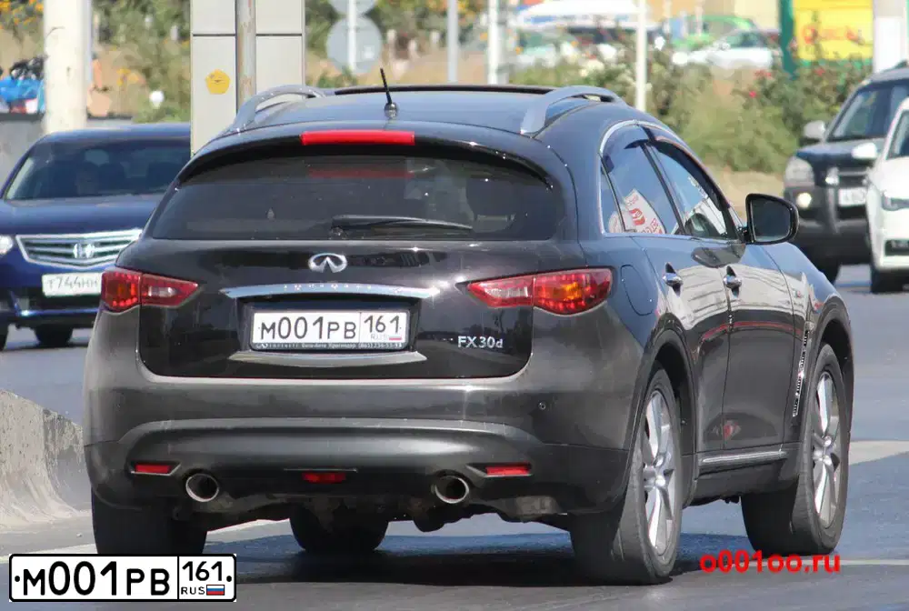 Фото автомобиля INFINITI QX70 /FX/, 2012 — госномер М001РВ161. Цвет: ЧЕРНЫЙ