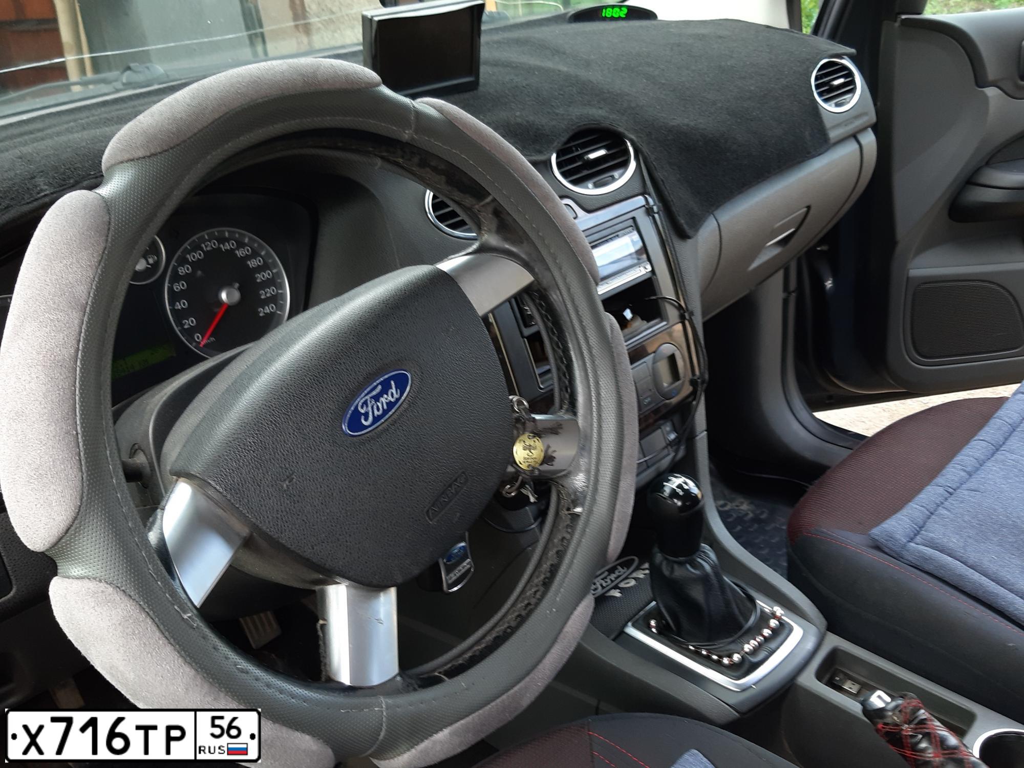Фото автомобиля FORD FOCUS, 2005 — госномер Е013КА156. Цвет: ТЕМНО-СЕРЫЙ