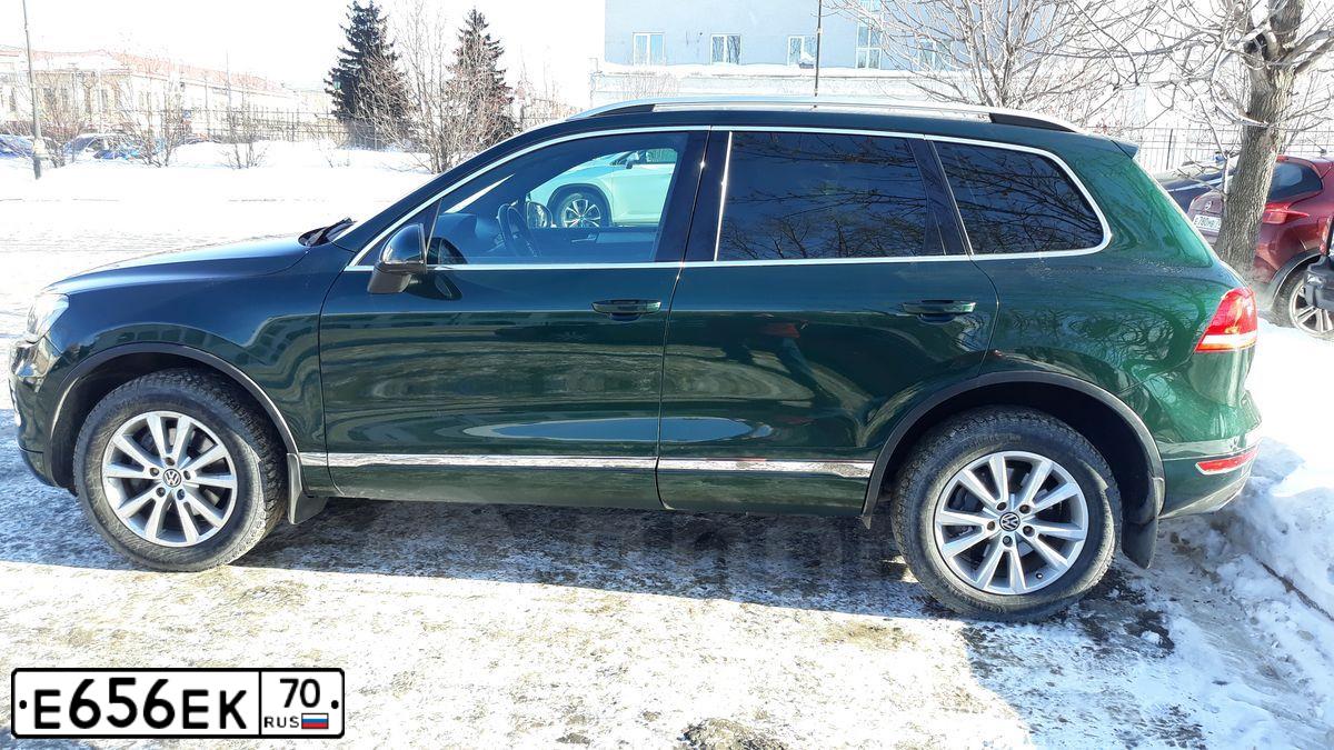 Фото автомобиля LANDROVER RANGE ROVER EVOQUE, 2013 — госномер Е656ЕК70. Цвет: Красный
