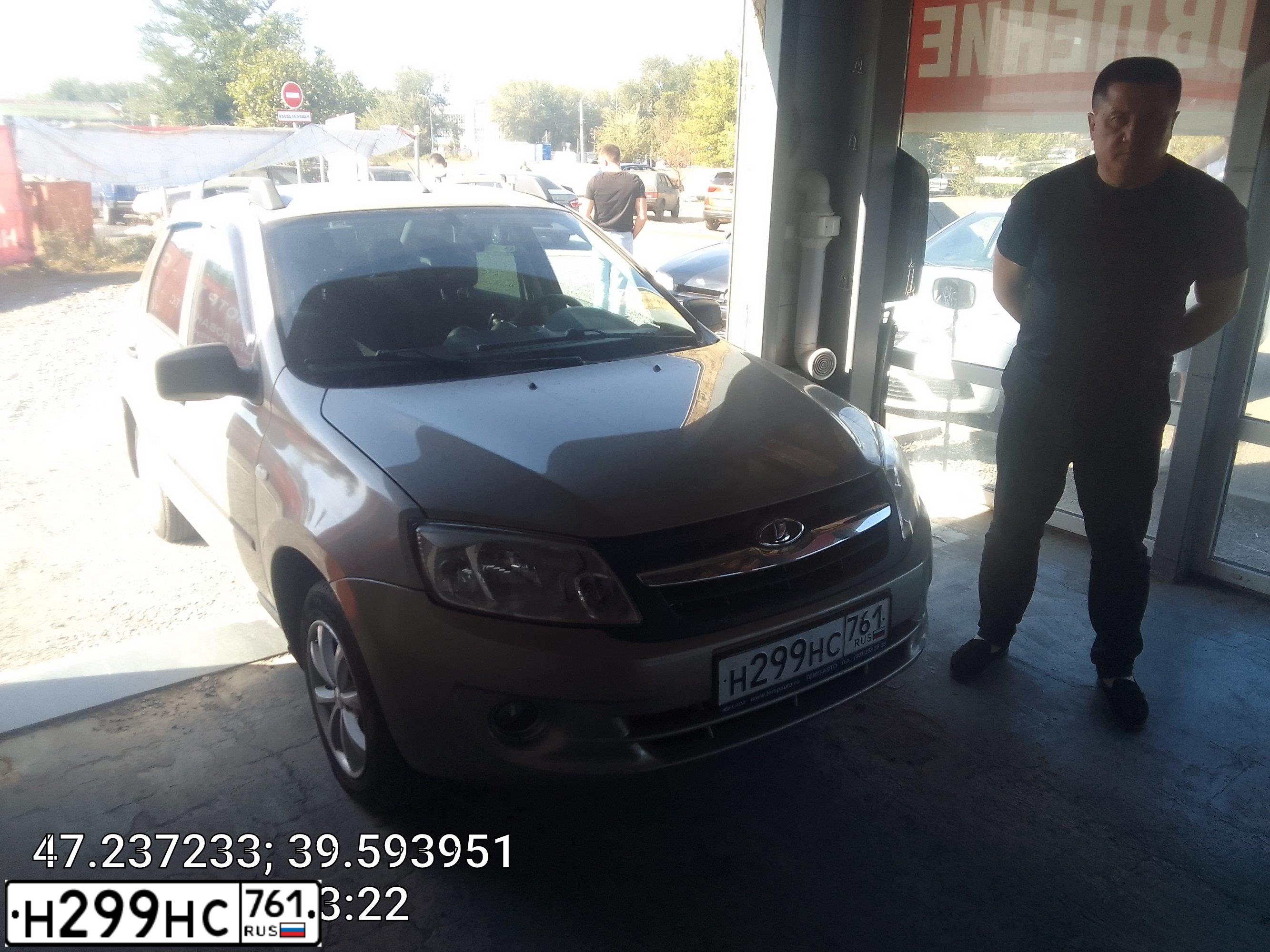 Фото автомобиля LADA 2190 GRANTA, 2012 — госномер Н299НС761. Цвет: СЕРО-БЕЖЕВЫЙ