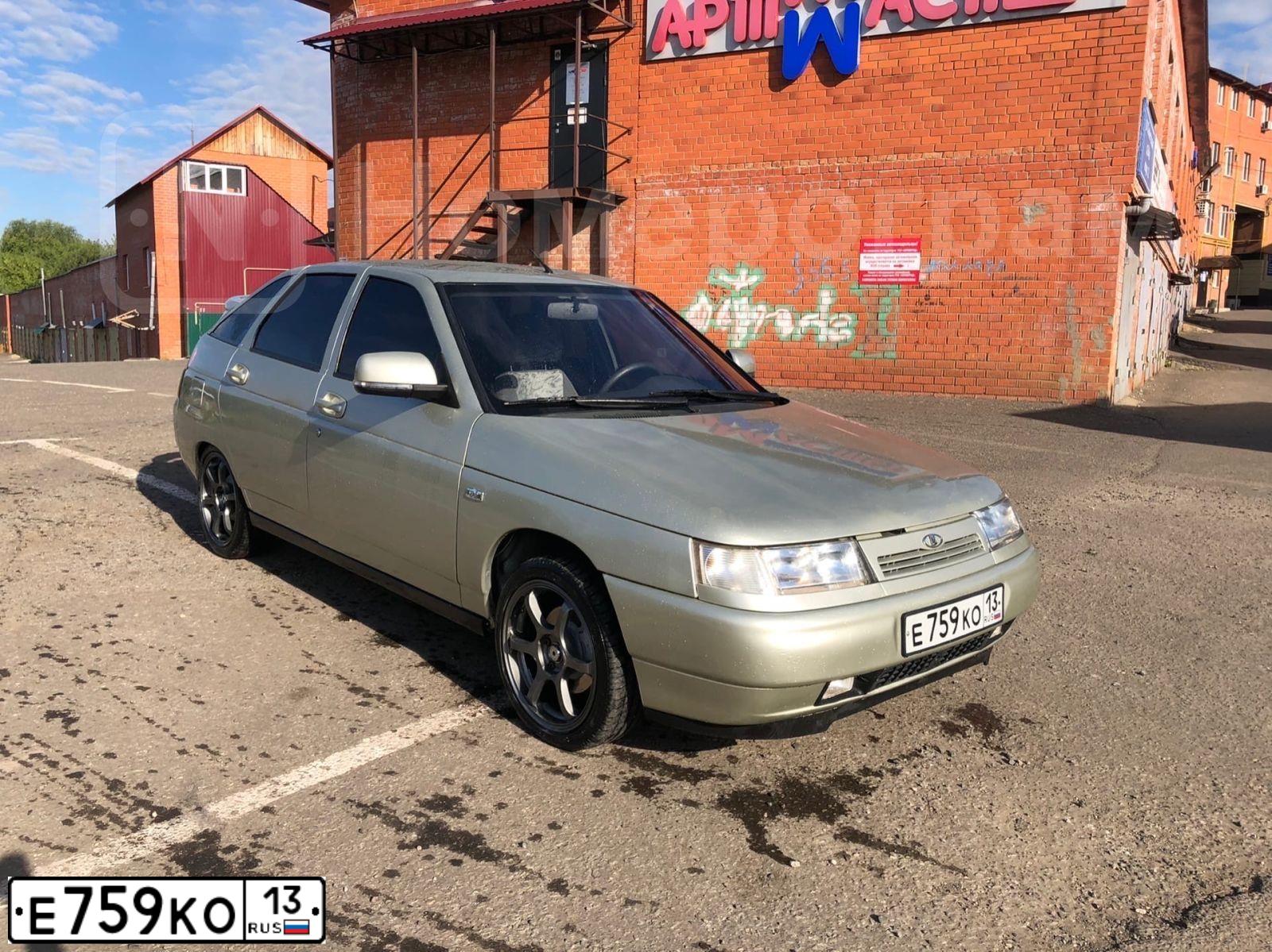 Фото автомобиля LADA 2112 LADA, 2006 — госномер Е834ЕУ11. Цвет: СЕРЕБРИСТО-БЕЖЕВЫЙ