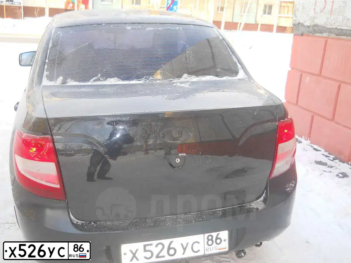 Фото автомобиля LADA 2190 GRANTA, 2012 — госномер Х526УС86. Цвет: Сине-Черный