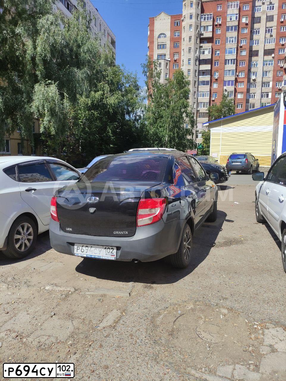 Фото автомобиля LADA 2190 GRANTA, 2014 — госномер Р694СУ102. Цвет: ЧЕРНЫЙ